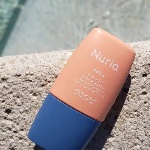 Nuria | Defend Matte Finish Daily Moisturizer with All-Mineral SPF 30 with Peach Flower